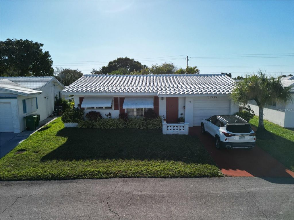Photo of 5709 NW 84th Avenue, Tamarac, FL 33321 (MLS # TB8471811)