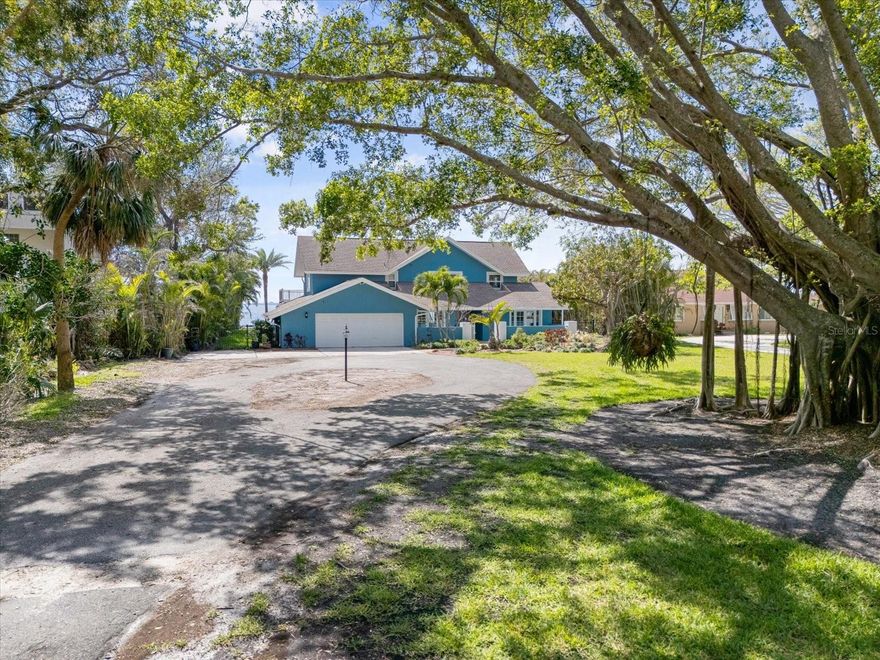 Discover Your Sarasota Waterfront Paradise!
Imagine waking up to the gentle sounds of Sarasota Bay, where your private beach meets 100 feet of pristine shoreline. This enchanting 5-bedroom, 4-full, and 2-half-bath residence masterfully combines timeless charm with modern comforts, creating the ultimate waterfront haven.
For those who cherish life on the water, this property is unparalleled. Nestled on nearly an acre, it boasts an expansive dock equipped with two boat lifts (24,000 lbs and 14,000 lbs capacities), ensuring your vessels are always ready for sun-soaked adventures on Sarasota Bay and beyond.
Step inside to be greeted by vaulted Cypress ceilings and panoramic windows that bathe the home in natural light, offering uninterrupted bay vistas. The first-floor primary suite is a serene retreat, allowing you to awaken to mesmerizing water views. It features a spacious walk-in closet and a luxurious bath with an infinity soaking tub. An additional guest suite and full bath on the main level ensure comfort and privacy for visitors.
Whether hosting intimate dinners or lively celebrations, the home’s thoughtfully designed layout caters to every occasion. Enjoy meals in the formal dining area, relax in the cozy family room, or prepare culinary delights in the well-appointed kitchen with a breakfast bar. The separate living room offers sweeping Sarasota Bay views, perfect for unwinding as boats drift by.
The expansive travertine pool deck invites you to indulge in Florida’s perpetual sunshine. An open-air pool and spa set the stage for memorable day-to-night entertainment.
Upstairs, three additional bedrooms, a loft area, two full baths, and a half bath provide generous space for family and guests, ensuring everyone has their own private sanctuary.
Located in the Whitfield Estates neighborhood, residents have the unique opportunity to enjoy dining at the nearby Sara Bay Country Club. For an optional annual HOA fee of just $35, you can enjoy a culinary membership that grants full access to the clubhouse for dining and social events (golf privileges not included).
Combining classic Florida allure with contemporary updates, this property invites you to experience the relaxed waterfront lifestyle that defines Sarasota. Don’t miss the chance to make this exceptional residence your own.