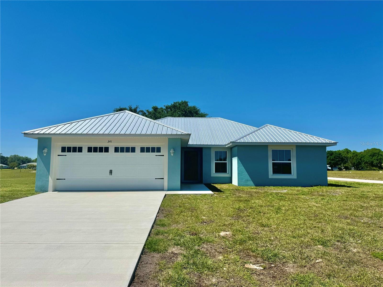 Ask about *4.75% Rate from Builders Preferred lender* With 5% down, payments as low as 1,530 P&I WAC!! Compared
to current 7.25% payments of 2,000 mo P&I makes this already attractive new construction home IRRESISTABLE!!
Beautiful brand new construction from Highlands County's most sought after builder. Located in Spring Lake This home
boasts a large open split floor plan that allows plenty of natural light into the living areas!! 3 bedroom 2 bathroom 2 car
garage. High end finishes include shaker style solid wood cabinets, granite countertops; This home sits on a beautiful
corner lot. Stainless steel appliance package in the kitchen; Metal roof. Active Golf course community. MAKE IT YOURS!