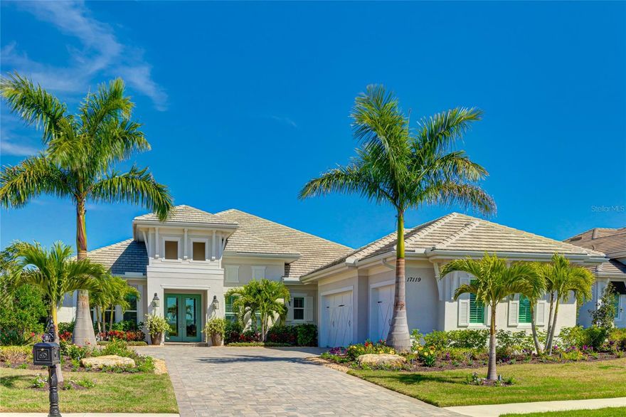 Nestled within the luxurious Lake Club community in Lakewood Ranch, this stunning residence presents an unparalleled opportunity for refined living. The Sterling III model by Stock Homes boasts an impressive array of features and amenities, epitomizing modern elegance and comfort.

Spread across 4 bedrooms and 4 bathrooms, including a spacious study, this home offers ample space for relaxation and entertainment. Wood floors grace the interior, complemented by quartz countertops and plantation shutters throughout, while soaring 13-foot ceilings add a sense of grandeur.

 The gourmet kitchen, the heart of the home, features a large island perfect for culinary endeavors and casual dining. Adjacent, is a full size eat in kitchen area that offers an inviting space for morning coffee or informal meals, bathed in natural light from the oversized windows.
Complete with a gas cooktop, convection oven, wine fridge, and pantry, the kitchen is designed for both functionality and style. Entertain with ease in the adjacent wet bar off the dining room, while the laundry room ensures convenience with included washer and dryer.  In addition to all of these comforts, they have also recently added a whole house filtration system and  upgraded to a continuous hot water supply. Luxuriate in the primary suite, featuring dual walk-in closets, a walk-in shower, and a freestanding soaking tub, offering a retreat of unparalleled luxury. Two guest bedrooms boast en-suite bathrooms, providing privacy and comfort for visitors.

Step outside to discover a true oasis, with expansive sliders connecting to the covered lanai overlooking long water views and a serene preserve. Entertain with ease in the gourmet outdoor kitchen, complete with a Green Egg, gas grill, and fridge, while a built-in fireplace sets the mood for alfresco gatherings. Enjoy the large saltwater pool and spa, perfect for relaxation and recreation.
 
Recently mulched and landscaped, the outdoor space exudes tranquility and sophistication, creating a picturesque backdrop for outdoor living. Relish in the resort-style amenities of the Lake Club, including a pool, spa, gym, and tennis courts, among others. With proximity to UTC mall, beaches, and the vibrant Main Street of Lakewood Ranch, every convenience is at your fingertips.

Experience the epitome of luxury living in Lakewood Ranch, where every detail has been meticulously crafted for the discerning homeowner. Don't miss your chance to call this exquisite property home. Bedroom Closet Type: Walk-in Closet (Primary Bedroom).