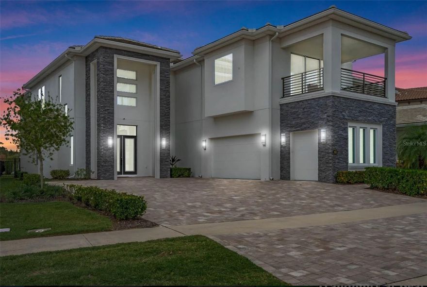 This is a phenomenal opportunity inside our exclusive Bear's Den subdivision! This beautiful  home will make has made a transition from residential home to  HIGH RENTAL INCOME in one of the most sought after areas in Reunion. This 8BR CUSTOM BUILD has everything you need for success. 3 Bedrooms downstairs and 5 up accompanied by a perfectly situated & dedicated MOVIE THEATER and MEDIA ROOM. Recent conversion from the 2 car Garage to Entertainment room has greatly enhanced the homes rentability.  The lot is exquisite if you like never ending SUNSETS and a fantastic covered lanai with a fully equipped outdoor kitchen and lounge area. FULLY FURNISHED with TRANSFERRABLE MEMBERSHIP and an added bonus with a GOLF CART GARAGE and numerous UPGRADES makes this home a must see for anyone looking to live in Reunion or rent out the home for maximum profit. Begin the day from your Media Room from a dedicated balcony and watch the Sunrise over Disney! Enjoy the day as you swim in the pool or lounge in the GREAT ROOM or have a dinner in the dining room with its 25'ceiling area open to the second floor or finish the day as you gaze out over the incredible back drop of the 18th hole on Reunion's Signature Nicklaus golf course all from the spectacular second level balcony. It's only a short walk away from the Dining, Fitness area, or Practice facilities of the Nicklaus Traditions Clubhouse for convenience. There isn't anything this home lacks! Come and see a perfect home in a perfect area and live out your dream at Reunion Resort. Call today to schedule a showing.