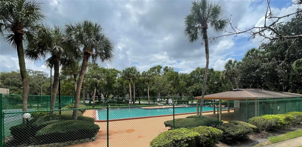 Photo of 14308 Hanging Moss Circle #101, Tampa, FL 33613 (MLS # TB8535892)