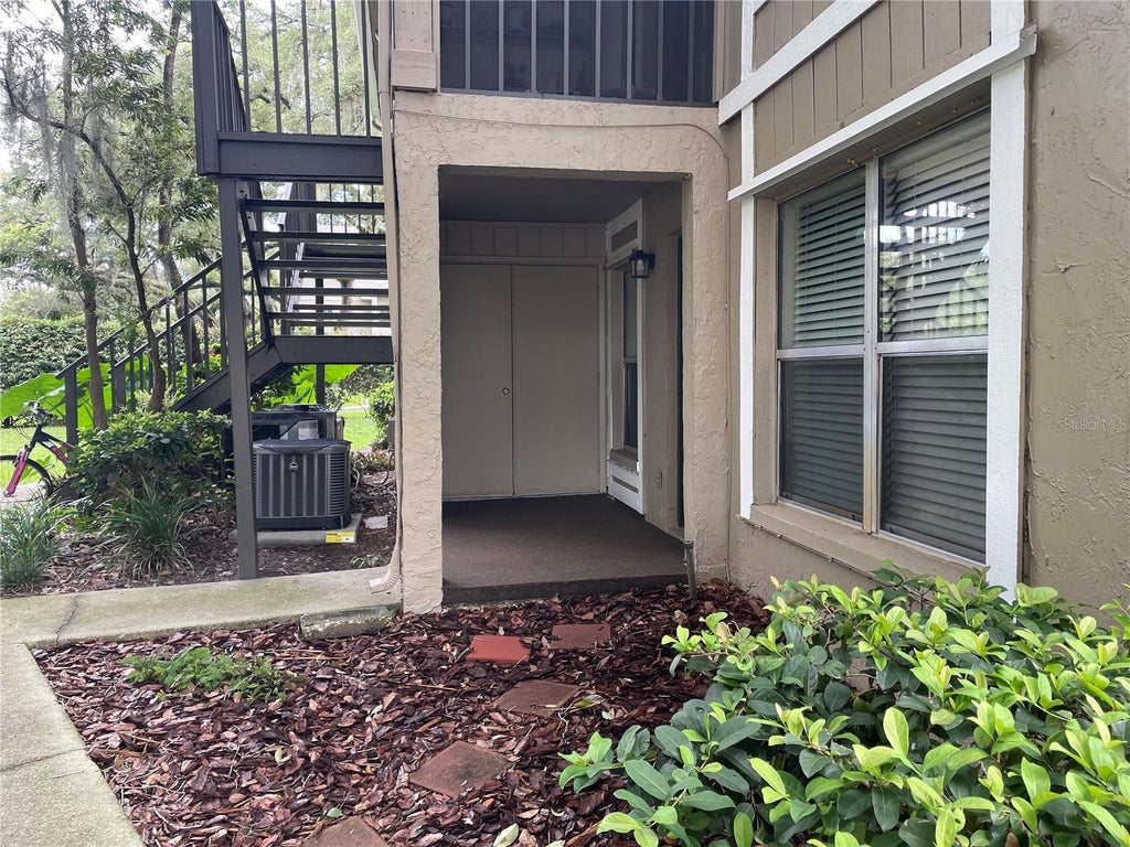 Photo of 14308 Hanging Moss Circle #101, Tampa, FL 33613 (MLS # TB8535892)