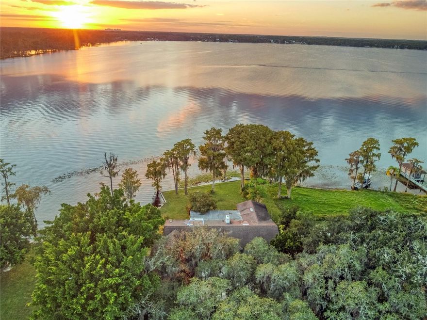 Experience the rare opportunity to own over 4.5 acres on the prestigious Butler Chain of Lakes, nestled along the exclusive “Millionaire’s Row.” This expansive 4.56-acre estate features approximately 2 acres of buildable land and 100 feet of pristine Lake Sheen frontage—perfect for boating, skiing, and all water sports.

A 4-bedroom, 2-bath residence currently occupies the property. The home is livable but largely original to its 1973 build date, offering immediate usability while leaving most of the value in the land itself. Surrounded by mature landscaping and accessed by a long private drive, the property offers exceptional privacy.

Enjoy breathtaking sunsets and nightly Disney fireworks right from your backyard. With no HOA, A-rated public and private schools nearby, and close proximity to Restaurant Row, Disney, Universal, and the new Epic Universe, as well as convenient access to I-4 and Orlando International Airport, this is truly a once-in-a-lifetime opportunity to build your dream estate in one of Central Florida’s most sought-after lakefront locations.