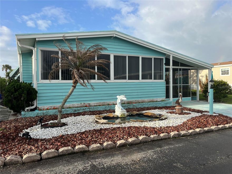 Under contract-accepting backup offers. Looking for an affordable property at the beach? Don’t miss out on this furnished 2-bedroom, 2-bath coastal home located in the highly desirable Surfside Estates 55+ community. Full of charm and character, this special home offers comfortable beachside living with thoughtful updates and unique features throughout. The front Florida Room has been opened up to add additional living space, creating a bright and welcoming area to relax or entertain. A rare grandfathered fenced area in the rear yard provides the perfect spot for your furry friends, as new fences are no longer permitted in Surfside Estates. Adding to the appeal, this home is situated adjacent to one of the community’s beautifully maintained garden parks, giving you the feeling of extra outdoor space without the upkeep. The screened carport is ideal for storing your golf cart, motorcycle, bikes, or fishing gear while protecting them from the salt air, and can easily be converted back to a traditional carport if desired. Additional features include an enclosed side porch, extra storage room, and a one-of-a-kind pond feature in the front yard that adds to the home’s coastal charm. Important updates include hurricane shutters, a metal roof professionally inspected and sealed with Lanco Urethanizer in April 2024, A/C replaced in 2018, and a new garbage disposal installed in 2024. Located in Surfside Estates, an active 55+ resident-owned manufactured home community nestled between the Atlantic Ocean and the Intracoastal Waterway, this property offers the true Florida lifestyle. Best of all, there is no lot rent when you purchase here, you own a share of this beautiful beachside community. The low monthly maintenance fee of $220 includes Wi-Fi, internet, cable, lawn care, management, and access to all community amenities. Residents enjoy a heated/cooled inground pool, fitness room, library, shuffleboard courts, rooftop deck, kayak storage, BBQ area, gazebo overlooking the Intracoastal, and two community docks perfect for fishing, watching dolphins, or enjoying breathtaking sunsets. The active Social Calendar offers endless opportunities to connect with neighbors, including bingo nights, card games, pool tables, exercise classes, water aerobics, and more. Walk across the street to the beach or hop on your bike or golf cart and explore everything in this coastal paradise. Just minutes away, the charming town of Flagler Beach offers local restaurants, shopping, and entertainment, while nearby mainland conveniences include hospitals, doctors, and additional shopping. Come experience this charming beachside getaway and claim your own piece of paradise!