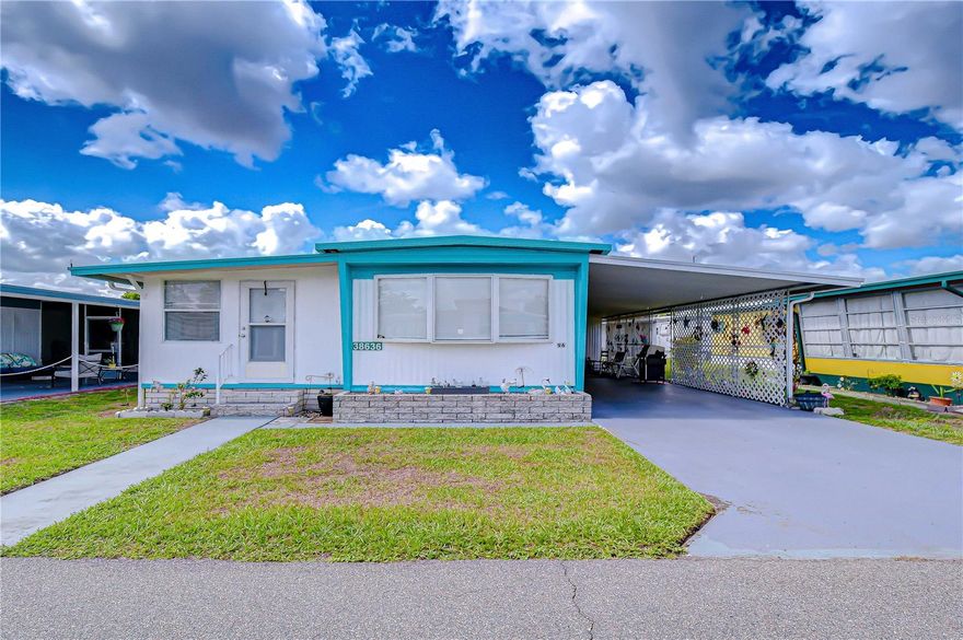 Cute, cozy, and ready for Florida living! Welcome to this quaint 2-bedroom, 1-bath singlewide home in SLEEPY HOLLOW  Senior Mobile Home Park. This furnished home offers an open living room and kitchen layout, creating a comfortable space for everyday living or entertaining guests. The kitchen features stainless steel appliances, including a stove and refrigerator that are approximately two years old. The bathroom has been nicely updated with a walk-in shower, and the A/C was replaced in 2025 for added peace of mind. A bonus room provides great flexibility and houses the washer and dryer. Use it as a guest space, craft room, home office, second TV room, or extra storage area. Outside, you’ll appreciate the covered carport and easy Florida lifestyle. Sleepy Hollow offers a welcoming senior community with a low monthly HOA of $120, which includes lawn mowing and trash. Residents enjoy a community pool, clubhouse, shuffleboard, and 
more. Bring your golf cart and settle into retirement comfort in the Sunshine State. This is the perfect winter retreat, downsizing option, or full-time Florida home.