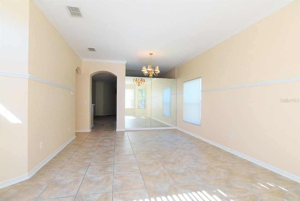 Photo of 8711 Hastings Beach Boulevard, Orlando, FL 32829 (MLS # O6398109)