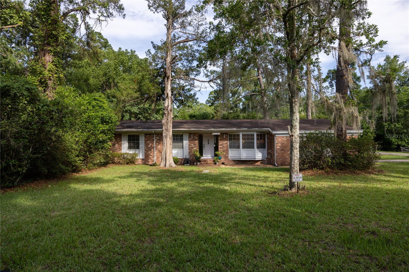 High Springs Retreat with Income-Generating ADU – Perfect for Airbnb!
Welcome to 18974 NW 244th St, a versatile and inviting property in the heart of High Springs—famously known as the Gateway to the Springs! This charming 3-bedroom, 2-bath home includes a detached guest suite/ADU, offering a fantastic opportunity for short-term rental income or a private space for guests.
The main home boasts comfortable living spaces, wood floors throughout the home, a well-equipped kitchen, and a peaceful backyard—ideal for hosting travelers looking to unwind after a day exploring the area's natural beauty.
The fully detached ADU is a true highlight, providing a turnkey Airbnb setup with private entry, making it ideal for vacationers or weekend adventurers. Whether you're offering it as a cozy couple’s retreat or a family-friendly space, the location can’t be beat.
Guests will love being just minutes from crystal-clear natural springs, as well as outdoor adventures like kayaking, canoeing, paddleboarding, and tubing. High Springs is a quaint little town with shops, restaurants, ice cream shops, and a brewery.
Whether you're an investor looking for a strong Airbnb performer or a homeowner seeking to offset your mortgage, this property is a rare find in one of Florida’s most beloved small towns.
Live, host, and earn—all in one place. Call for your private showing today