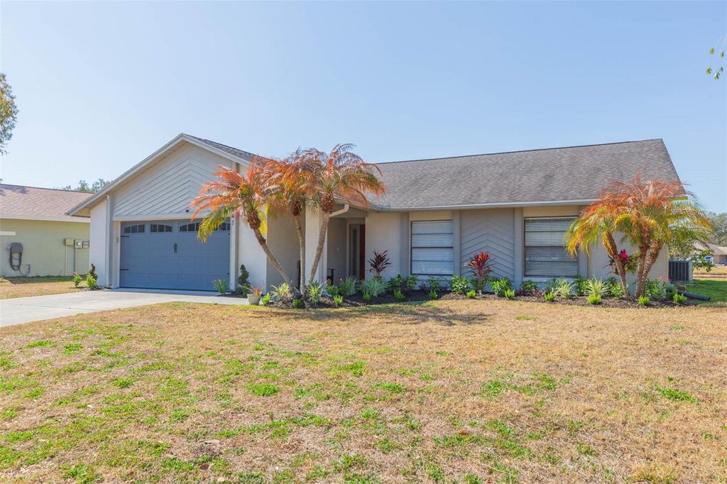 Photo of 1941 Tampa Bay Drive, Wesley Chapel, FL 33543 (MLS # TB8467555)