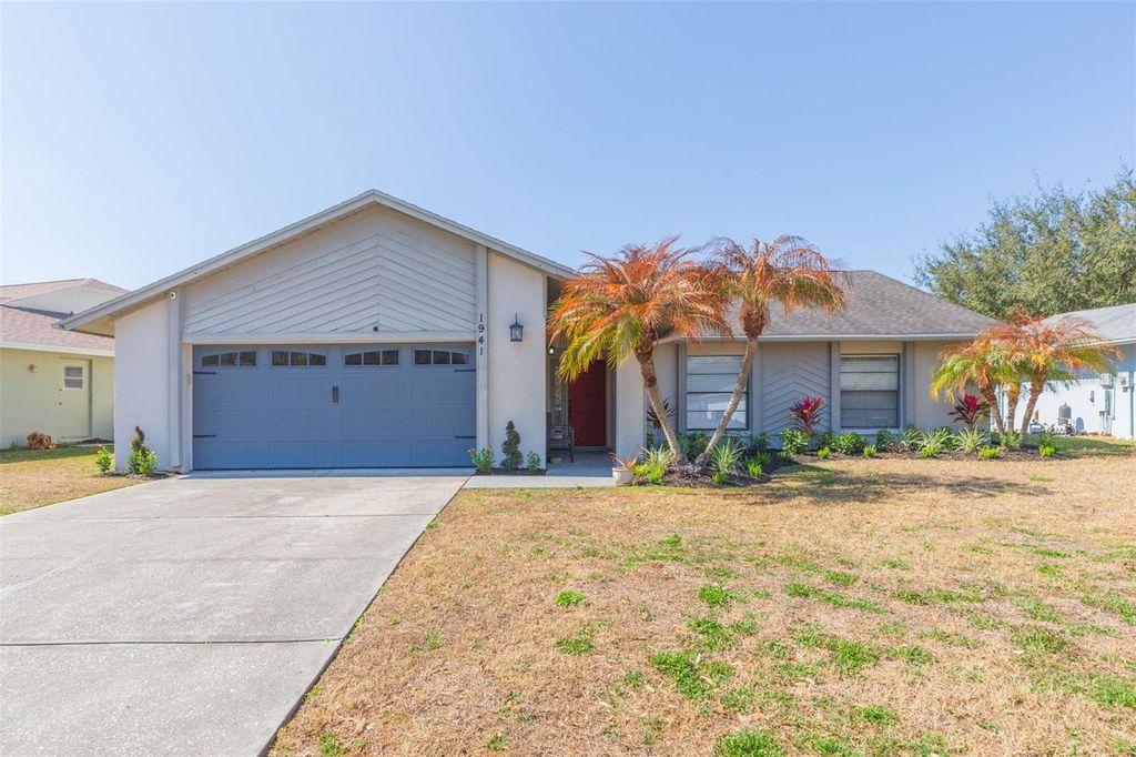 Photo of 1941 Tampa Bay Drive, Wesley Chapel, FL 33543 (MLS # TB8467555)