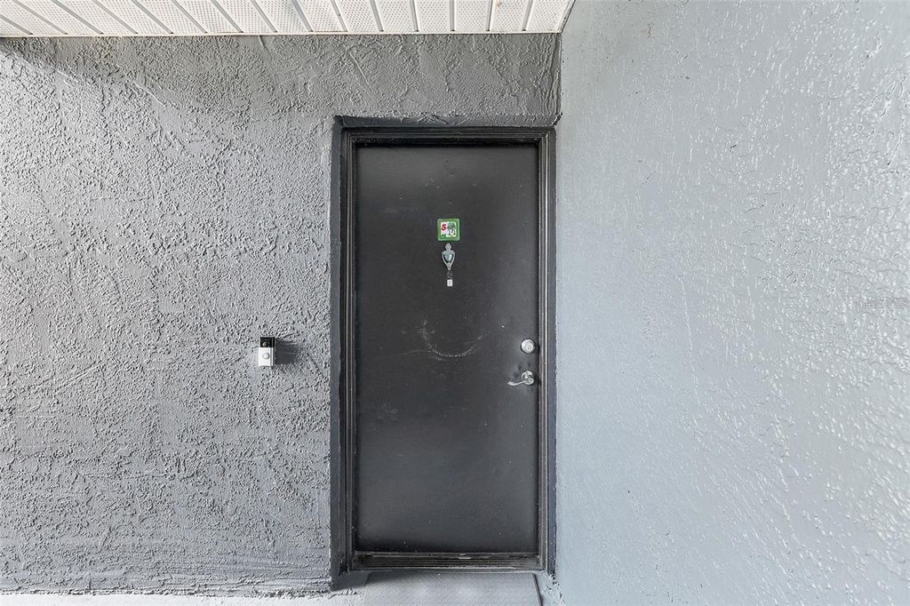 Photo of 4252 Pershing Pointe Place #5, Orlando, FL 32822 (MLS # O6411910)