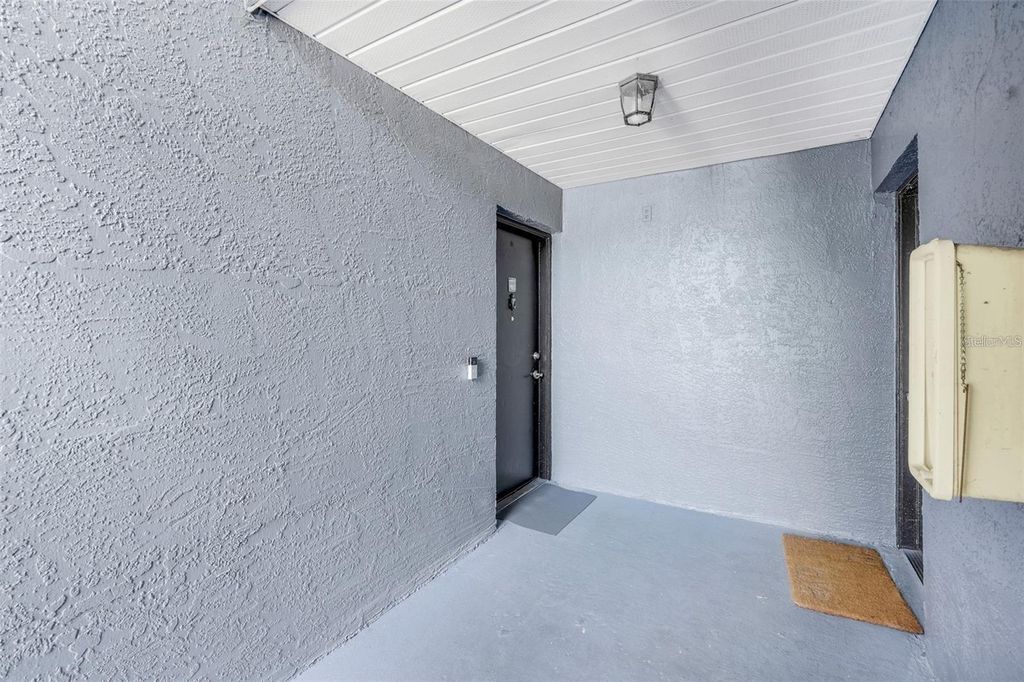 Photo of 4252 Pershing Pointe Place #5, Orlando, FL 32822 (MLS # O6411910)