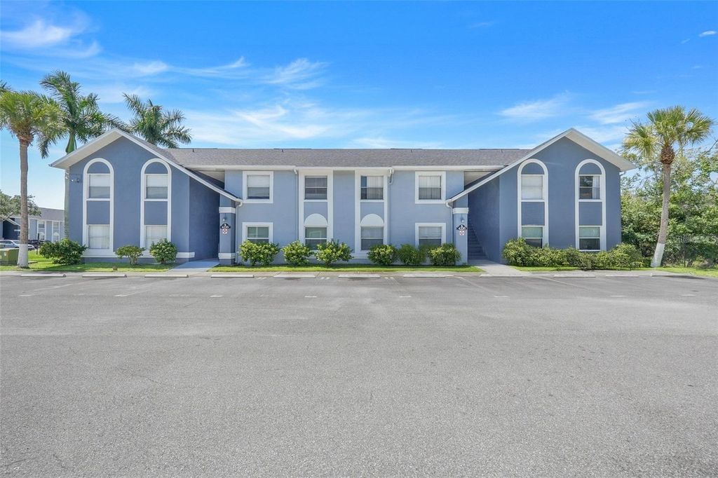 Photo of 4252 Pershing Pointe Place #5, Orlando, FL 32822 (MLS # O6411910)
