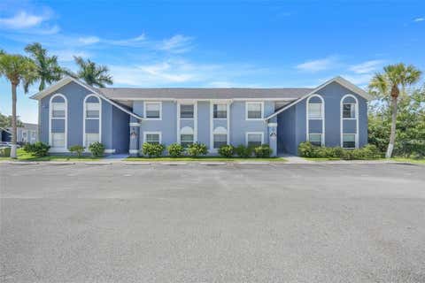 Photo of 4252 Pershing Pointe Place #5, Orlando, FL 32822 (MLS # O6411910)