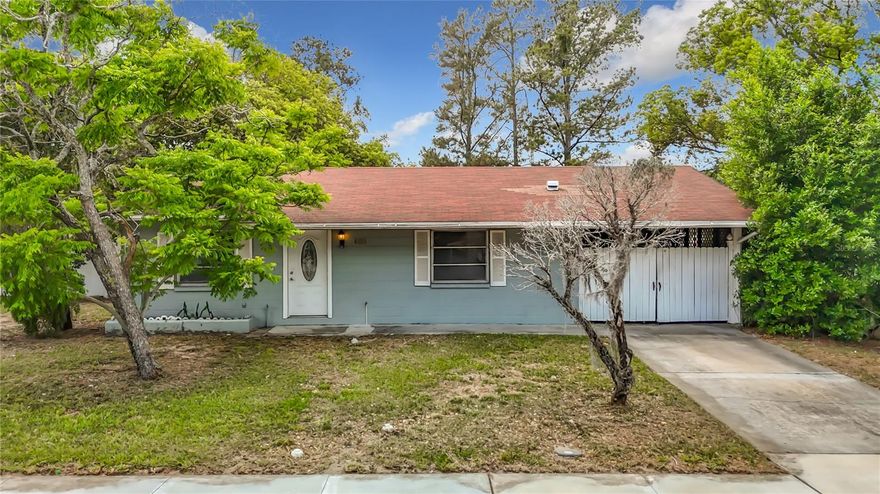 Discover the perfect blend of comfort, versatility, and Florida living at 6155 9th St in Zephyrhills, FL 33542. This charming one-story home sits on a spacious 0.21-acre lot and features 2 bedrooms and 1 full bathroom in the main living area, highlighted by a great open kitchen and living room layout that invites effortless entertaining and daily relaxation.
A large bonus room with a second full bath is attached to the rear of the home and includes its own private entrance, offering flexible space that could easily convert into a separate attached studio unit with the simple addition of a kitchenette—ideal for guests, multigenerational living, or extra income potential. The property boasts a huge fenced rear yard, providing ample room for outdoor activities, gardening, or simply unwinding in privacy amid mature landscaping.  2017 AC and previous owner seller disclosure shows roof as 2019.
This well-located home in the heart of Zephyrhills places you within easy reach of everyday conveniences while offering quick access to a wealth of nearby attractions and destinations. Skydiving enthusiasts can head to Skydive City right in town for thrilling tandem jumps or training, while nature lovers will appreciate short drives to Crystal Springs Preserve (with its miles of wooded trails and stunning natural springs), the Upper Hillsborough Preserve (featuring extensive multi-use trails for hiking, biking, and horseback riding along the Hillsborough River), and Hillsborough River State Park (known for scenic paddling, camping, and wildlife viewing).
Local highlights include Zephyrhills Brewing Company for craft beers and food trucks, the Zephyrhills Museum of Military History and Depot Museum for a dose of local heritage, and charming downtown shops and eateries. Within a short 20-mile radius, you'll find family-friendly spots like Zephyr Park & WaterPlay, golf courses, and the vibrant small-town charm of nearby Dade City (about 10 miles away) with its antique stores and historic sites.
A quick drive of around 15-20 miles south reaches Plant City or Wesley Chapel for additional shopping and dining, while Tampa (roughly 30 miles away, often under an hour's drive) opens up world-class options including Busch Gardens Tampa Bay, ZooTampa at Lowry Park, the Florida Aquarium, and endless urban amenities. Whether you're seeking peaceful suburban living with room to grow or convenient proximity to outdoor adventures, theme parks, and city excitement, this versatile property in Zephyrhills delivers an unbeatable lifestyle opportunity.