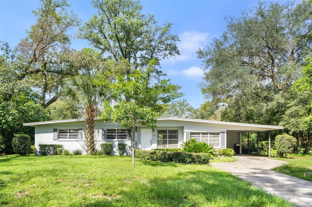 Photo of 300 NW 34th Drive, Gainesville, FL 32607 (MLS # GC543561)