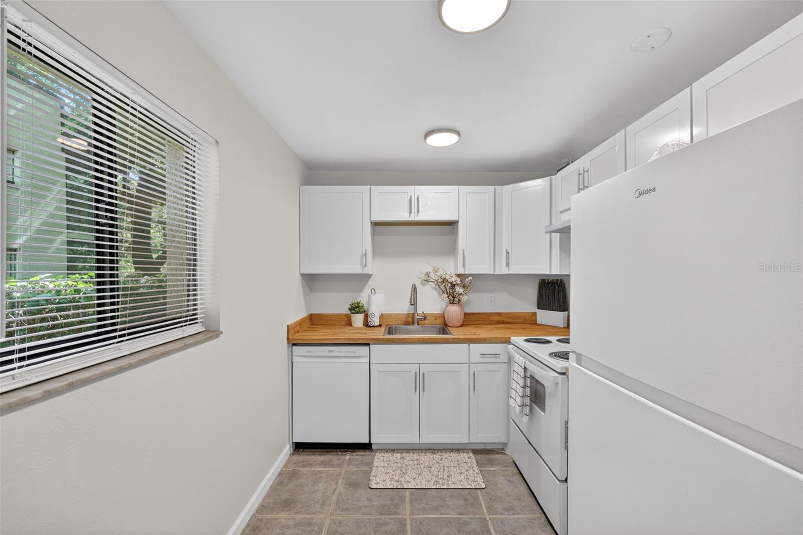 11715 RAINTREE VILLAGE BOULEVARD A