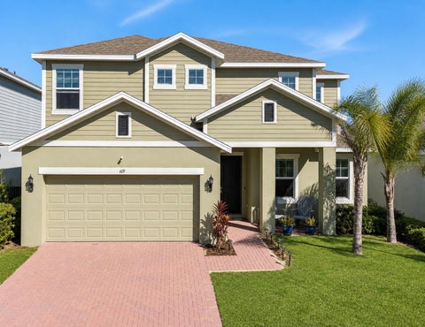 Photo of 609 Fortuna Drive, Davenport, FL 33837 (MLS # O6384784)