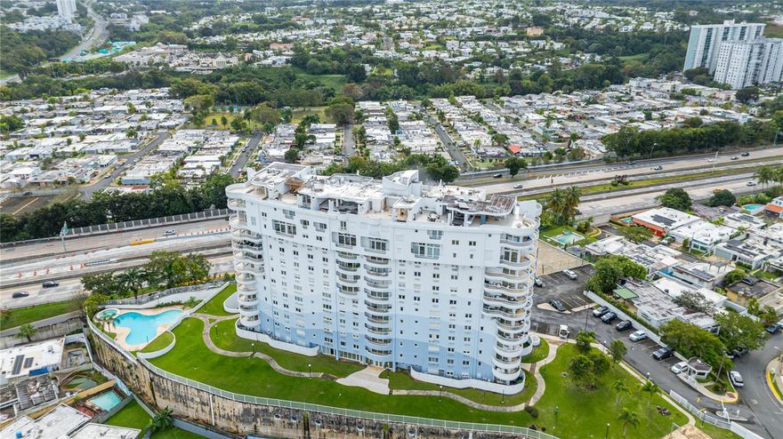 Unit 704 at Cond. Mont Blanc in San Juan offers 3,250 square feet of spacious living with 4 bedrooms, 3.5 bathrooms, a comfortable family room, dedicated laundry area, and a generously sized kitchen ideal for everyday living and entertaining. The residence features private terraces with open views toward Montehiedra and Los Paseos, creating a seamless indoor-outdoor experience. The unit includes three parking spaces and a private storage room. The condominium is equipped with a full-capacity power generator and water cistern for added peace of mind. Amenities include a swimming pool, fitness center, activity room, basketball court, and upcoming pickleball courts. Conveniently located with direct access to the expressway, offering easy connectivity to schools, shopping, and dining while maintaining a private residential setting.