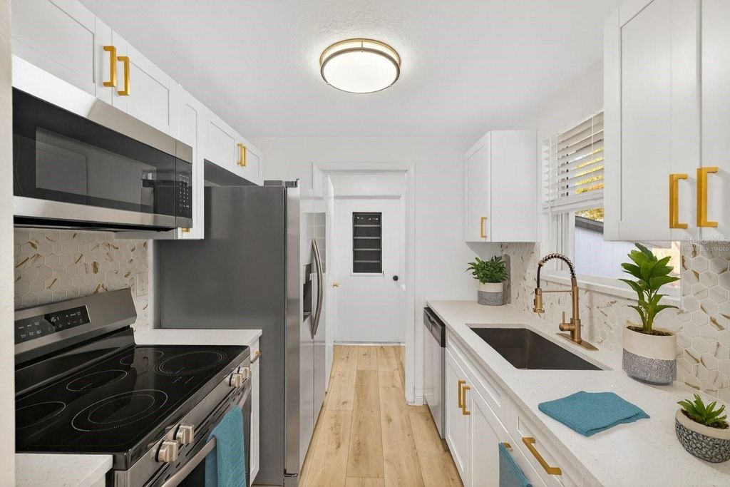 Photo of 9748 Bayside Court, Spring Hill, FL 34608 (MLS # TB8450240)