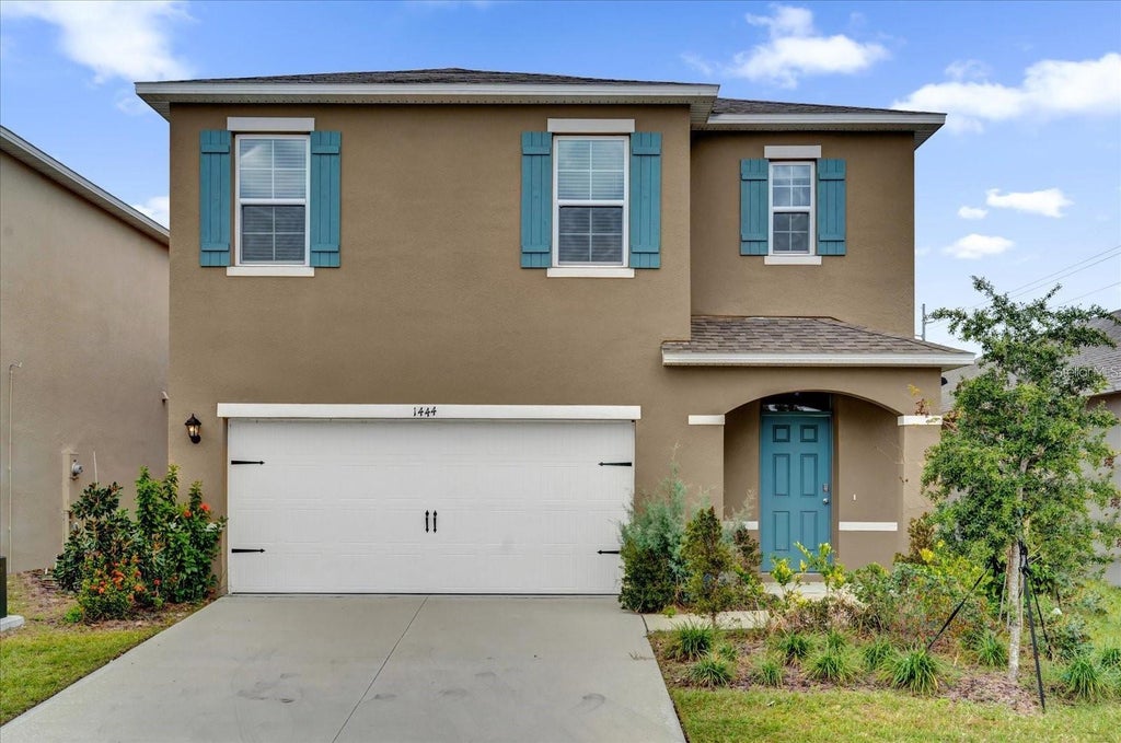 Photo of 1444 Berry Lane, Davenport, FL 33837 (MLS # O6432827)