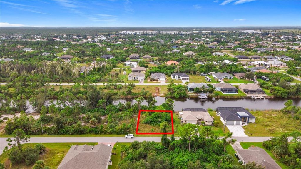 Photo of 15149 Amsterdam Avenue, Port Charlotte, FL 33981 (MLS # TB8430430)
