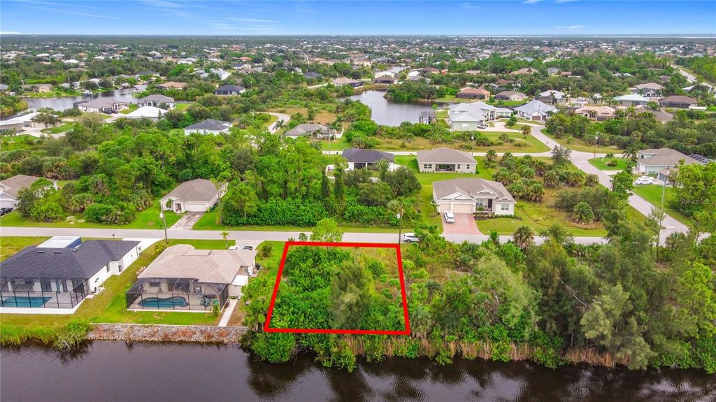 Photo of 15149 Amsterdam Avenue, Port Charlotte, FL 33981 (MLS # TB8430430)