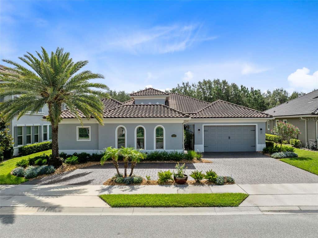 Photo of 3895 Grassland Loop, Lake Mary, FL 32746 (MLS # O6423258)