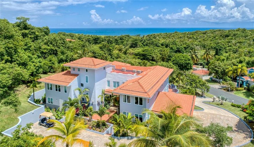 Alluring and timeless, this striking residence with a contemporary Mediterranean design is beautifully nestled atop the hills of Palmas del Mar. Enjoy panoramic views, which serve as the perfect backdrop for entertaining friends and family. The home's 5 bedrooms and 4.5 bathrooms are spectacularly displayed throughout the 4,738 Sq. Ft. open interior layout, as well as a great room, family room and office. Multiple outdoor areas, which provide an additional 1,500 Sq. Ft., enhance and elevate the abode, such as a roof-top terrace, patio with pool and a balcony that connects to two of the bedrooms. A 20-KW generator and a 3-car garage are also conveniently provided. 7 Shell Castle is truly a rare and precious find that offers potential owners the ability to live in their ideal home.

Offering the ultimate levels of comfort and convenience, Palmas del Mar is internationally renowned for its top golf courses, tennis courts, equestrian center, private school, restaurants, shopping venues and beachfront location on the southeast coast of the island. Only a 40-minute drive away from San Juan, enjoy the pinnacle of resort living while still being in close proximity to the Metropolitan area.

Annual HOA Fee: $900.