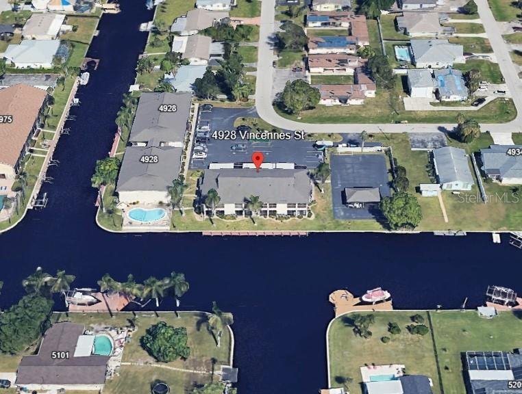 This is one of the best kept Gems in South Cape Coral. Le Grand Marquis Condos not only has a great location and amenities, but also some of the best residents of SW Florida. This 1st Floor Unit has been well maintained and mostly remodeled with lots of New Features, including A/C, Paint, Flooring, Cabinets and Counters. But most Spectacular is the Waterfront View as soon as you walk in the door. This South facing view of the Intersecting canal leads out to the Gulf with a short boat ride. Keep your Boat at the Community Dock and enjoy a dip in the Heated Community Pool, as well as Coffee and/or Margaritas at the Community Cabana/Pavillion. This Beautiful Condo features 2 Bedrooms plus an Office/Den area, and a Lovely Kitchen with the Beautiful View of the Water! A Large Lanai features Sliding Doors from the Living area and MBR, Storage and Laundry, Screen and removable Plexi-Windows along with the Incredible Vast View of the Water. Watch the daily Wildlife and frequent Dolphin & Manatee visits from your Lanai, Dock, and Pool. The Master BR is spacious and has awesome views, along with a large walk-in closet. This condo is in the highly desired SE Cape Coral. It is a short walk to Grocery, Markets, Shops, Restaurants and more. And a short drive to the Wonderful Beaches of SW Florida.