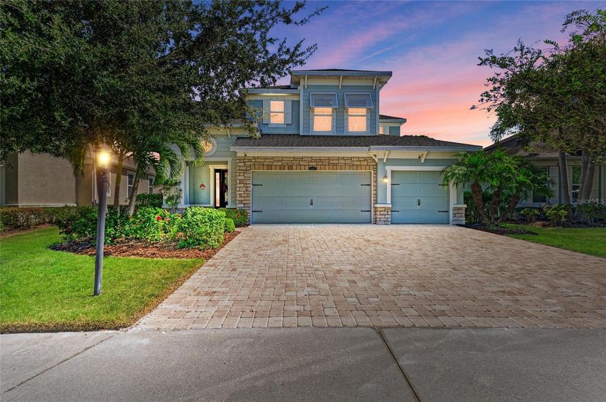 This impeccably updated residence blends refined style with a premier location close to the best of Lakewood Ranch and Sarasota. Boasting three bedrooms, two and a half bathrooms, an office and a spacious three car garage, the home is perfectly positioned on a serene cul-de-sac. The exterior showcases modern color tones, elegant stone accents and lush landscaping that elevate its curb appeal. Inside, a welcoming foyer and formal dining area lead to rich wood floors that flow into a bright, open great room, kitchen and breakfast nook. The kitchen is a true chef’s delight with dazzling quartz countertops, white cabinetry, stainless steel appliances and under cabinet lighting. The primary suite, conveniently located on the first floor, provides a luxurious retreat with a soaking tub, walk-in shower and an expansive custom walk-in closet. Upstairs you will find two additional bedrooms, a loft, a den with glass French doors and a full bathroom with double vanities. Recent updates mean you can move in without lifting a finger. The interior has been freshly painted, a new AC added and the exterior has a new fence and roof replaced in 2025. A whole home reverse osmosis system also adds peace of mind. Step outside to your private backyard oasis where a sparkling saltwater pool awaits. Surrounded by a generous covered lanai space overlooking a tranquil pond and nature preserve, this retreat features upgraded pool equipment including a new pump, panel, salt system, filter and solar thermostat. Residents of Harmony enjoy maintenance free living and exclusive community amenities including a beach entry pool with lap lanes, a well equipped clubhouse and fitness center and a playground. Set in the heart of Lakewood Ranch, this home has close proximity to restaurants, shopping, entertainment and the rich cultural experiences that make Sarasota one of Florida’s most desirable places to live.
