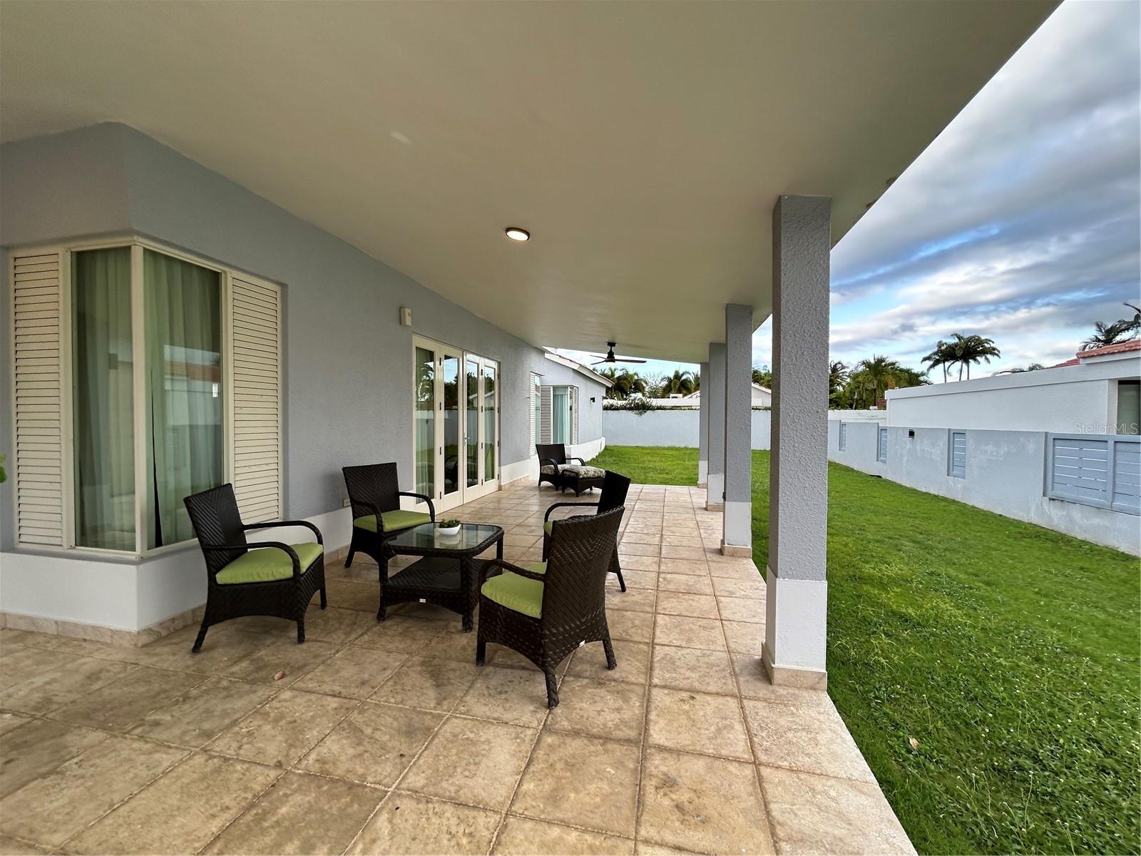 This stunning fully furnished 4-bedroom, 3.5-bathroom one-level home. Designed with cathedral ceilings and open living spaces, this residence offers comfort and elegance. Located in Sabanera Dorado community, enjoy top-tier amenities including a gym, pools, tennis and basketball courts, a soccer field, a café with a convenience store, and golf cart trails. Home to TASIS School and surrounded by lush tropical landscaping, this is resort-style living at its finest