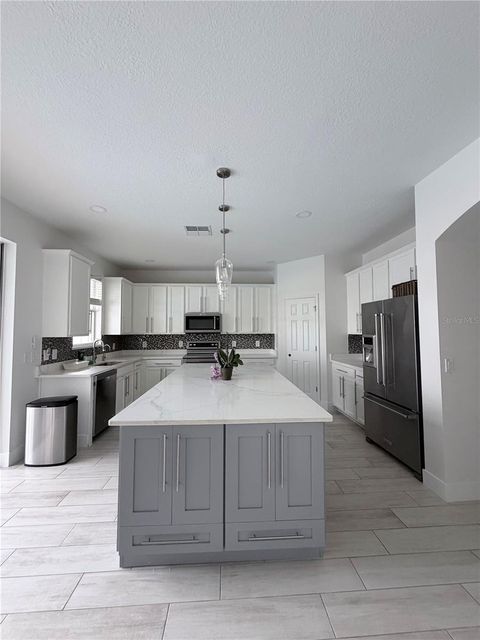 Tiny photo for 312 Peacock Springs Court, Groveland, FL 34736 (MLS # TB8499582)