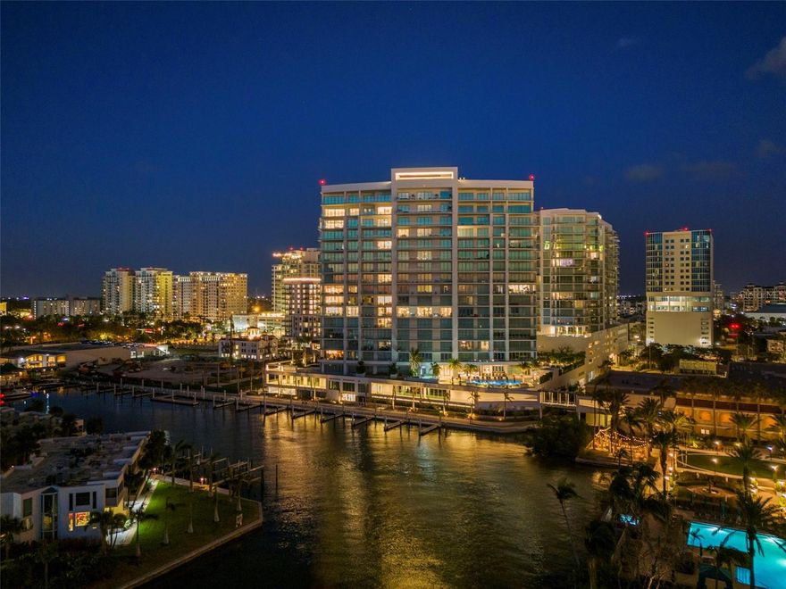 Experience the pinnacle of luxury at The Ritz-Carlton Residences, Sarasota—where waterfront sophistication meets the vibrancy of downtown living. This premier community redefines luxury with its unparalleled services and extensive amenities. This lavish residence offers 3 bedrooms and three and a half bathrooms within over 3,700 square feet of space, beautifully blending open living areas with private retreats. Add to this nearly 1,000 square feet of outdoor patios, perfect for both intimate family moments and hosting sophisticated gatherings. The expansive glass walls bathe the home in light, showcasing panoramic views of Sarasota Bay, the glittering city, and the serene Gulf of Mexico.

The kitchen stands as a centerpiece of design, featuring sleek wood and quartz, hidden cabinetry, high-end appliances, and an impressive island with waterfall edges, complemented by a wet bar for your cocktail hours. Retreat to the master suite, a haven of tranquility with custom cabinetry and a masterfully tiled bathroom, complete with direct access to the lanai for your morning ritual. Step onto your balcony for relaxation or entertainment, where the clear glass railings ensure nothing comes between you and the stunning vistas of water, skyline, and sunset. Enjoy amenities that elevate living to a resort level, including a pool area that could be your private island escape, complete with ample lounging areas, a grill for your poolside BBQs, and outdoor dining for unforgettable evenings under the stars. The Ritz-Carlton Residences, Sarasota, offers more than just a home—it's a lifestyle, with a fitness center, dual pools, a hot tub, event and game rooms, and exclusive access to hotel and spa facilities, all supported by 24/7 valet service. Embrace the luxury you've always deserved at The Ritz-Carlton Residences, Sarasota.