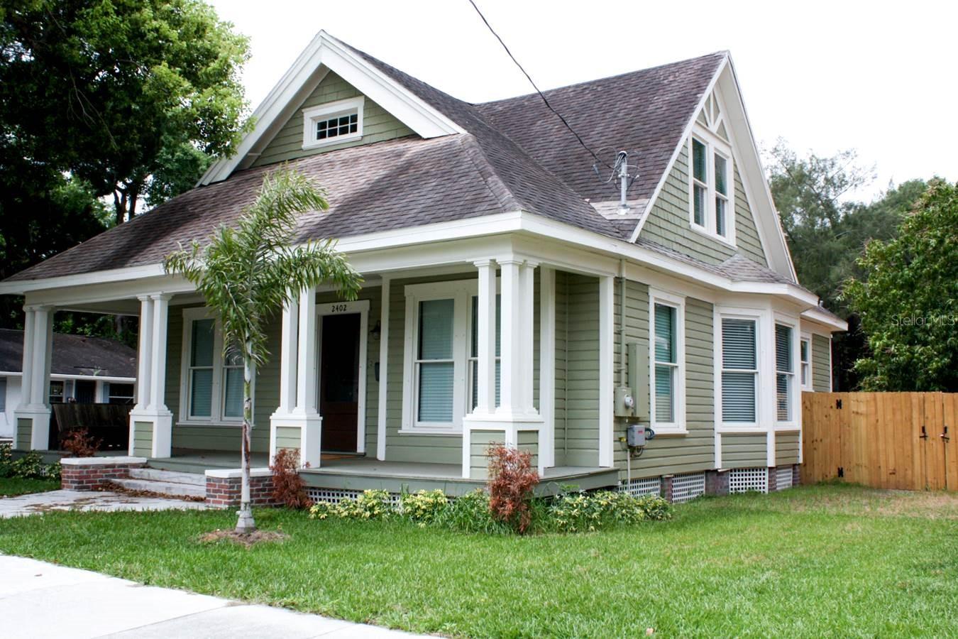 Amazing 4BR, 2BA Bungalow in historic Tampa Heights. Home has been FULLY RESTORED with lovely front porch and open floor plan – perfect for family gatherings or entertaining friends with all the convenience and amenities of newly built homes. Enjoy spacious nine-foot ceilings and antique 5-panel doors with natural light from oversize windows shining on the beautifully restored oak flooring and brick faux fireplace. The large kitchen, complete with granite counters and stainless-steel appliances, is accented with historic pendant lighting and boasts an original Butler’s Pantry for storage. Both first and second floor BRs have large bathrooms with pedestal sinks and historic style medicine cabinets. Laundry is easy with convenient front-loaded washer-dryer combo in the bonus room which can also be used as a perfect office or den! Plus, the backyard is fully fenced for your privacy. Located in one of the most walkable neighborhoods – the historic Tampa Heights District, this PET FRIENDLY home is only minutes from Downtown Tampa, Seminole Heights, Ybor City and Tampa’s new Armature Works Park and Riverwalk. Call for your Showing today! LAWN MAINTENANCE IS INCLUDED!!