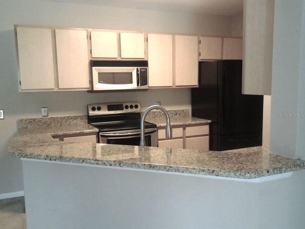 Photo of 6578 Swissco Drive #124, Orlando, FL 32822 (MLS # O6385325)