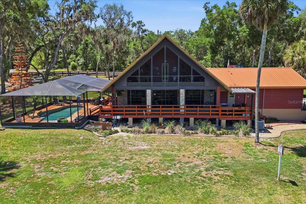 Photo of 1471 N Lagoon Point, Inverness, FL 34453 (MLS # OM724941)