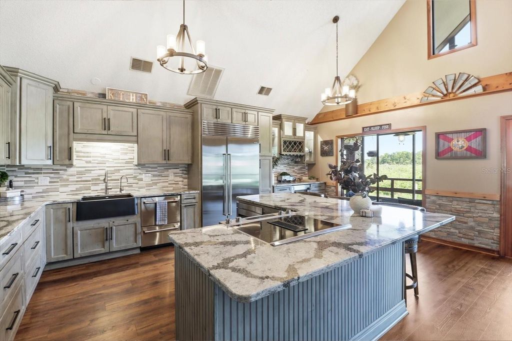 Photo of 1471 N Lagoon Point, Inverness, FL 34453 (MLS # OM724941)