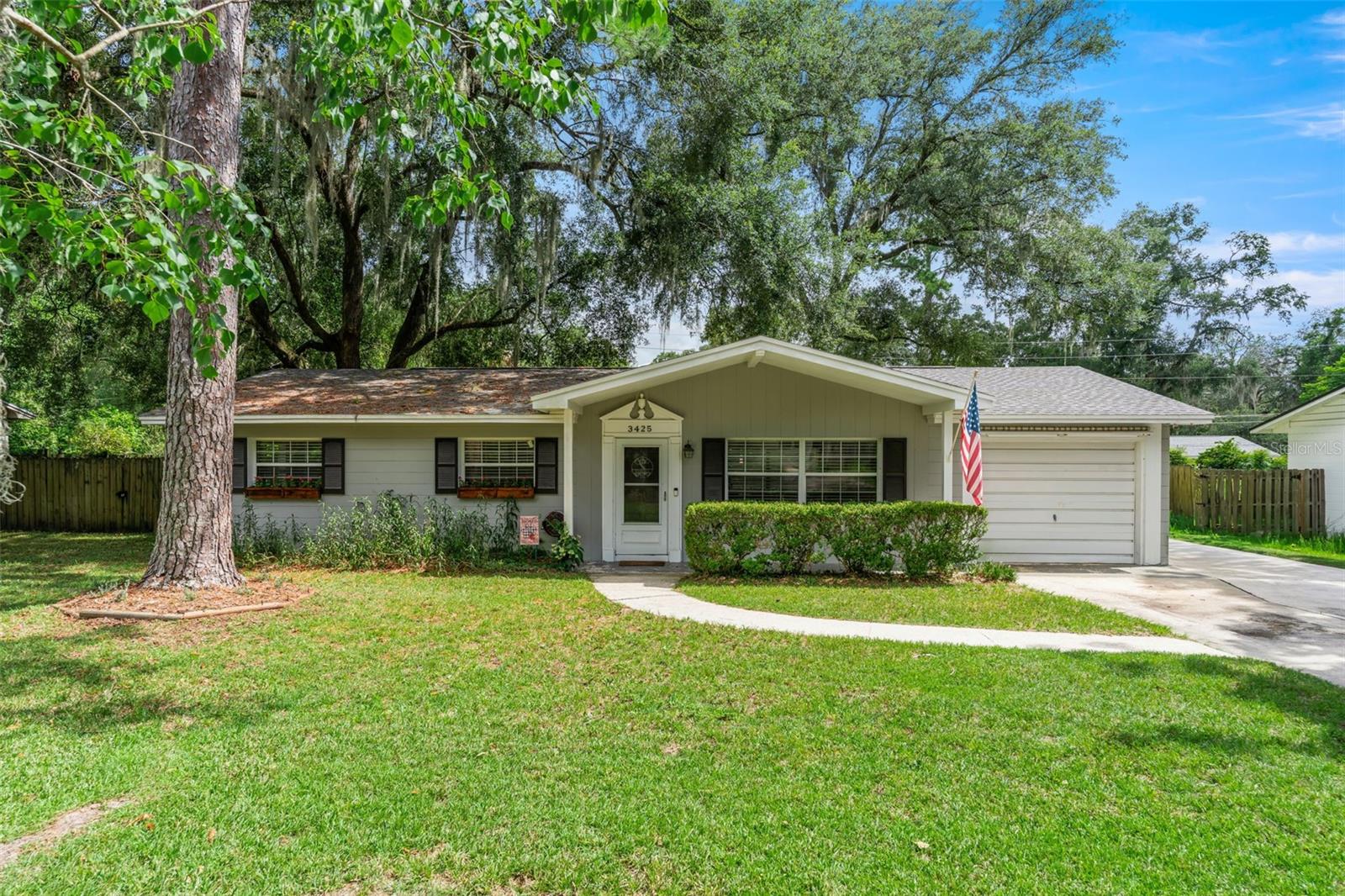 Welcome to this charming and move-in-ready 3-bedroom, 2-bathroom home located in the sought-after Westside Estates neighborhood. With 1,215 sq. ft. of living space on a spacious 0.25-acre lot, this home perfectly blends comfort, style, and convenience.
Inside, you’ll find a renovated kitchen and bathrooms, fresh interior paint, and a living room/dining room combo that creates a warm and open space for relaxing or entertaining. The home has also been thoughtfully updated with partially replaced plumbing and a recently replaced roof, offering peace of mind for years to come.
Step outside to the back porch, the perfect spot to enjoy Florida evenings without the bugs. The fully fenced yard provides privacy, security, and room to play or garden.
Located within walking distance to Littlewood Elementary and Westwood Middle School, this home is ideal for families or anyone looking to be near top-rated schools and close to everything Gainesville has to offer.