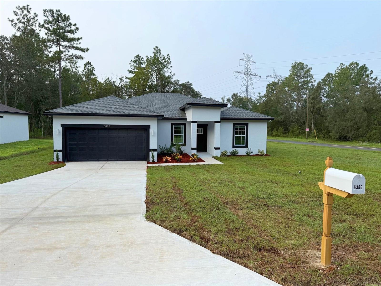 Under Construction. 0.29 CORNER LOT. This beautifully designed Arpoador model features 4 spacious bedrooms, 3 full bathrooms, and 1,891 sq ft of heated living space, with a total construction area of 2,333 sq ft. The home is finished with SLEEK FIXTURES AND ACCENTS, giving it a clean, modern aesthetic throughout.
The open-concept kitchen is a showstopper with a WATERFALL QUARTZ ISLAND with a striking dark slatted wood accent and comes fully equipped with stainless steel appliances—refrigerator, range, microwave, dishwasher, and disposal.
The luxurious owner’s suite offers a STANDALONE TUB, glass-enclosed SHOWER DOOR, and dual vanities. Additional highlights include a SMART KEY entry system, double car garage, covered entry, and a 2-10 HOME WARRANTY for added peace of mind.
*Photos refer to the model home*
Receive up to $1,000 in lender credits toward appraisal and credit report when financing through On Target Mortgage, our preferred lender.
Don’t miss this opportunity—schedule your private showing today!