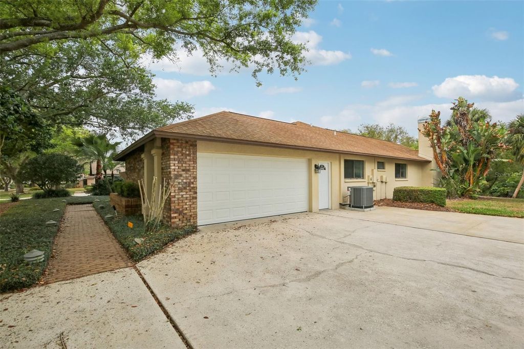 Photo of 17913 Clear Lake Drive, Lutz, FL 33548 (MLS # TB8484418)