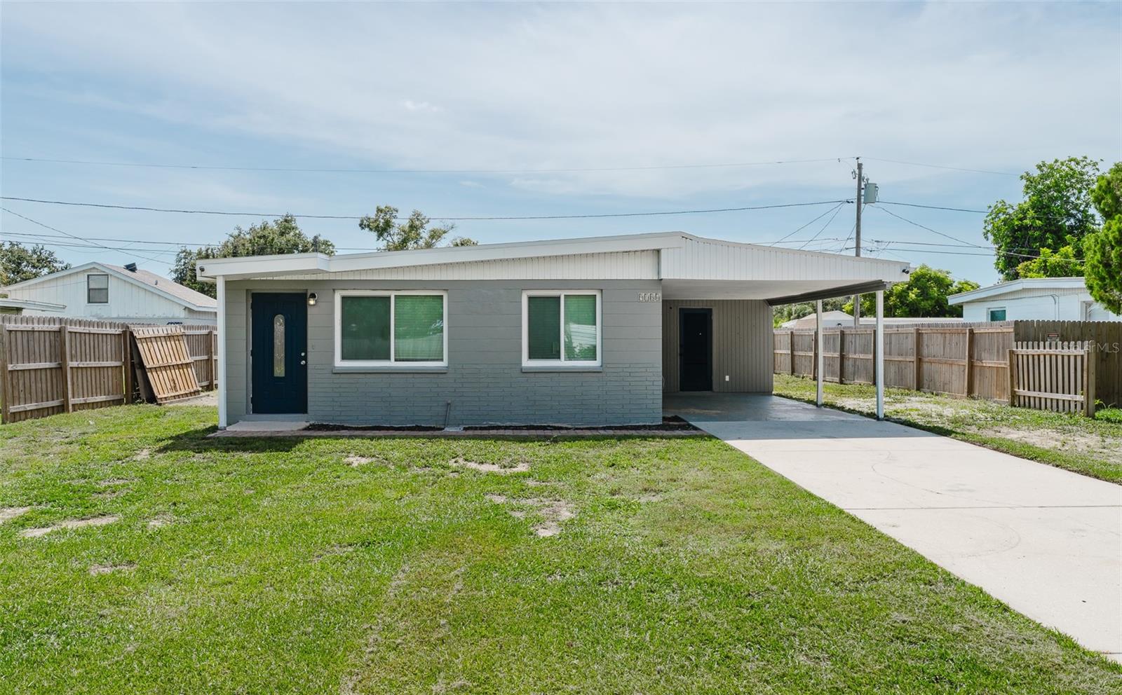 Nestled in the heart of Seminole, this affordable 3-bedroom, 1-bathroom home has been thoughtfully updated and is not located in a flood zone, meaning no flood insurance is required. With no HOA or CDD, you’ll enjoy the freedom to make this space your own. As you arrive, you’ll appreciate the covered parking, offering shade and convenience year-round. This home has a brand new roof (2024) and updated windows and doors (2021) for added peace of mind. Inside, you’ll find all new vinyl plank flooring throughout, fresh interior paint, and a camera security system already in place. The living room flows effortlessly into the kitchen and cozy dining area. The three bedrooms provide flexible space for your needs, and the updated bathroom features a new vanity and modern tub-to-ceiling tilework. Step outside to the oversized backyard—a private space with plenty of room for outdoor activities or future additions. Located just minutes from Seminole City Center with a wide variety of shopping and dining options, and only 3 miles to the Gulf Beaches. Parks and the nearby Pinellas Trail offer even more ways to enjoy the Florida lifestyle.