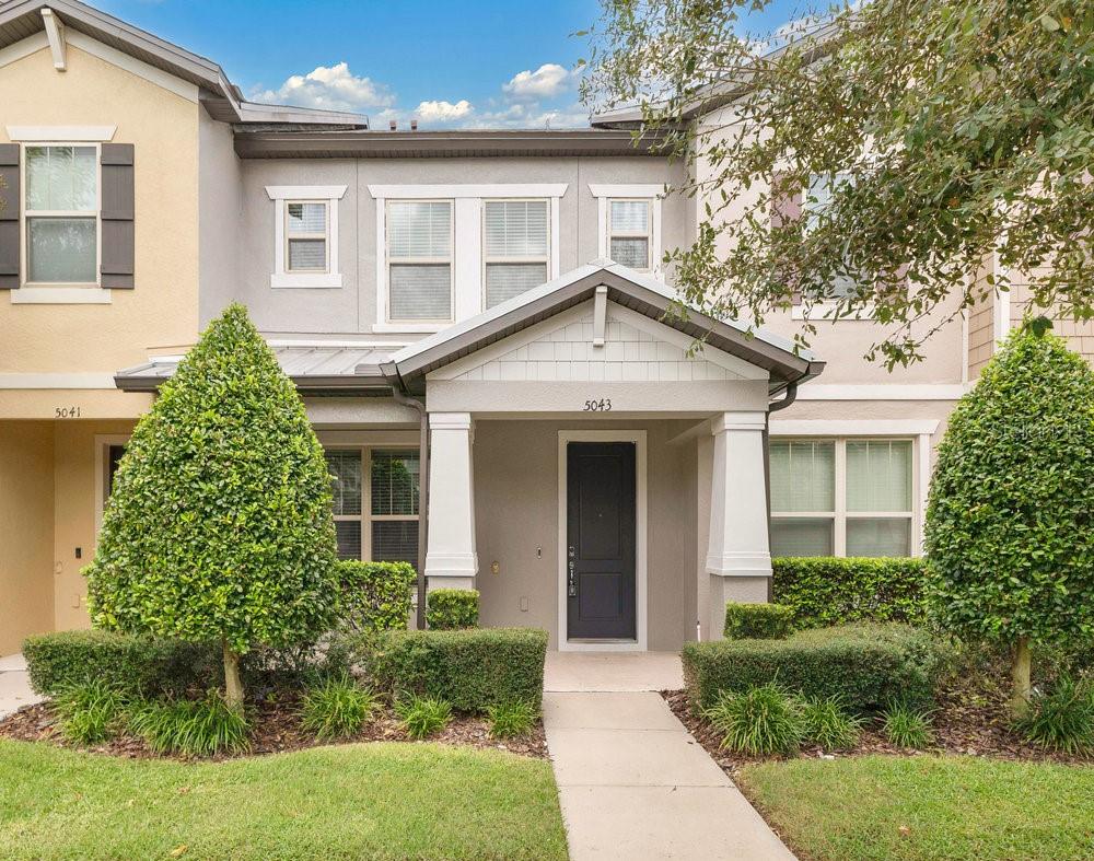 Beautiful upgraded, 3 bedroom, 2.5 bath townhouse right outside of Lake Nona with Lake Toho chain of lakes access and community boat slip! Come see the spacious floorplan with a gorgeous upgraded kitchen, granite counters, pendant lights, stainless vent hood, large ceramic tile, separate laundry room and plenty of storage. Ceiling fans installed. , My-Q smart garage door, keyless door lock, and a Z wave smart light with dimmer in the front entry. Like to entertain? The private rear patio is the perfect space for a fire pit, BBQ and gathering around the table for dinner under the stars. Primary Bedroom is spacious, has a walk-in closet & en-suite bathroom with double vanities, granite counters and a private toilet. Bedrooms #2 & #3 share the hall bathroom. Lakeshore is a gated community just a short drive to Orlando International Airport and all Orlando's famous Theme Parks. Also it is close to major highways and Eagle Creek golf course. Community features a resort style pool, fitness center, clubhouse, basketball court, playground, dog park and a dock out into East Lake Tahoe. Enjoy all the restaurants, shopping and entertainment of Lake Nona, right in your backyard! Welcome home!