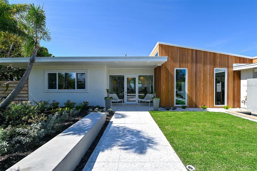 This striking residence in the highly sought-after neighborhood of Lido Shores was designed by famed Mid-Century Modern Architect Philip Hiss from the Sarasota School of Architecture and a Guy Peterson remodel design. The clean, crisp lines, style of this home will delight the enthusiast of rare architecture. The residence has been meticulously maintained over the years. Its unique design and integrity have been preserved, enjoyed, and much appreciated both by residents and guests and passersby. Walls of glass pocketing sliders open virtually every room of the interior and harmoniously blending with the expansive caged, private, outdoor living/pool/spa area. Strategically placed windows throughout supply an abundance of constant light making this the perfect place for the art aficionado. Four bedrooms and four bathrooms offer plenty of space for guests and family. The cook's kitchen, with gas appliances, ample prep areas, storage, and cabinetry, features an island for informal gathering and dining. Complete with wood burning fireplace, the family room invites you to relax, enjoy a book, or take advantage of the view of lush, exotic plant species within the fenced backyard. The residence has had the exterior redone in the past year adding Cumaru, an extremely durable Brazilian wood siding, sewer lines have been relined and upgraded the electric panels. The owners have architectural plans for expanding the master suite, enclosing the garage, and building a gazebo in the back yard. Walk or ride a bike to the Lido Shores Homeowners' Association deeded, gated, private beach access and cabana on beautiful Gulf of Mexico where the association has a weekly Sunday sunset social by joining the voluntary association currently $300 per annum. Conveniently located only a short distance to Longboat Key and St. Armand's Circle for fine award-winning dining and shopping.