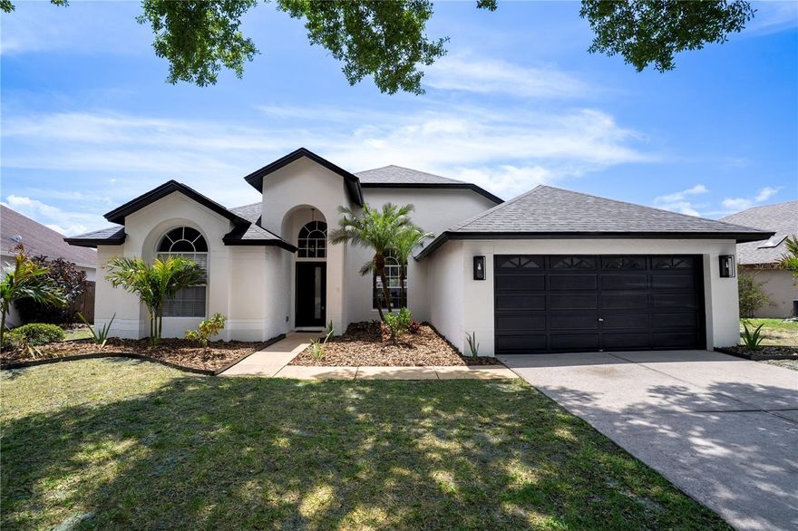 This beautifully updated 4-bedroom, 2-bath single-family home in Tampa offers the perfect combination of modern upgrades and functional living space. Featuring a newer roof, windows, and HVAC system, this home provides peace of mind along with stylish improvements throughout, including fresh interior paint, LVP flooring in the main living areas, and fully renovated bathrooms and kitchen. The open-concept layout seamlessly connects the living room, kitchen, dining area, and family room beneath soaring vaulted ceilings. The spacious kitchen is a true centerpiece, complete with stone countertops, stainless steel appliances, a stunning tile backsplash, recessed lighting, and an oversized island overlooking the living room. Just off the kitchen, the dining area includes additional cabinetry, countertops, and a wine fridge for added convenience. The primary suite is a private retreat with dual walk-in closets leading into an oversized en-suite bath featuring a deep soaking tub, beautifully tiled walk-in shower, dual sinks, and a dedicated vanity space. Step outside to a fully fenced backyard designed for relaxation and enjoyment, showcasing a screened-in lanai with an in-ground pool, perfect for Florida living year-round! Ideally situated near top destinations like Busch Gardens Tampa Bay, ZooTampa at Lowry Park, Tampa Riverwalk, and the beautiful Gulf Coast beaches, as well as a wide array of shopping, dining, and entertainment options, this home truly has it all. Don’t miss your opportunity to make this exceptional property yours, schedule your private showing today!
