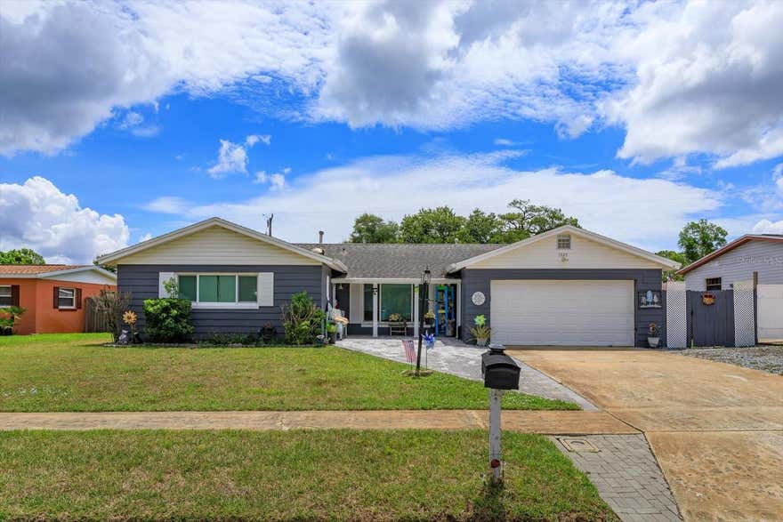 Don't miss this beautifully maintained 3-bedroom, 2-bath concrete block pool home in the highly desirable Imperial Estates community. Designed for both everyday living and entertaining, the home features a spacious floor plan with multiple living areas, including a family room, formal dining area, and flexible space ideal for a home office, playroom, or hobby area.The kitchen is the heart of the home, offering Corian countertops, upgraded appliances, a center island, and plenty of space for family gatherings. The primary suite and bath have been tastefully updated, while two additional bedrooms and a guest bath provide comfortable accommodations for family and guests.Step outside to your private Florida oasis featuring a screened, in-ground saltwater pool with solar heating, creating the perfect setting for year-round enjoyment. A 2-car garage and approximately 9-year-old roof add peace of mind.Conveniently located near shopping, dining, schools, parks, Kennedy Space Center, and major commuter routes, this move-in-ready home offers the perfect blend of comfort, functionality, and Florida lifestyle. Schedule your private showing today! Buyer to verify room dimensions.