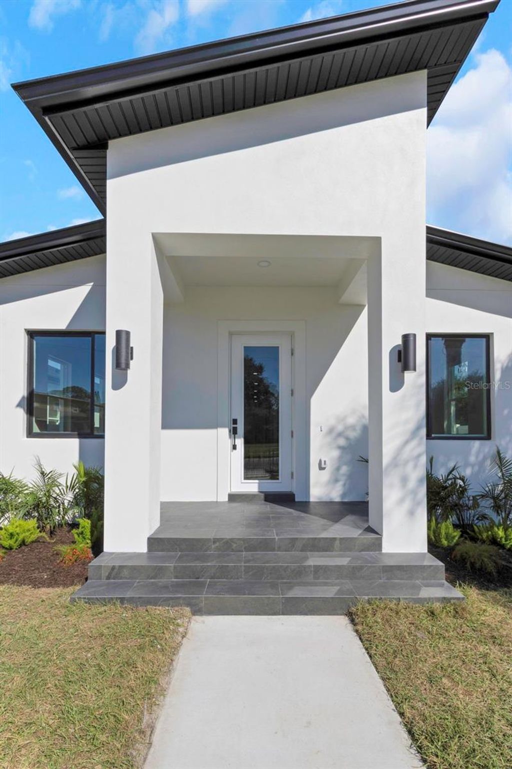 Photo of 701 42nd Avenue S, St Petersburg, FL 33705 (MLS # TB8446011)