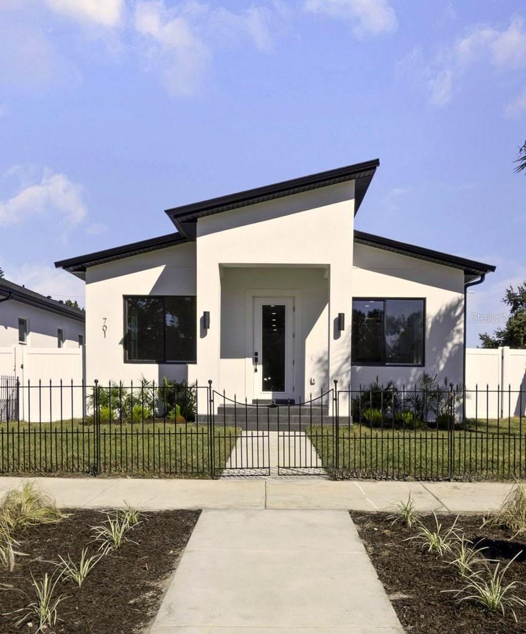 Photo of 701 42nd Avenue S, St Petersburg, FL 33705 (MLS # TB8446011)