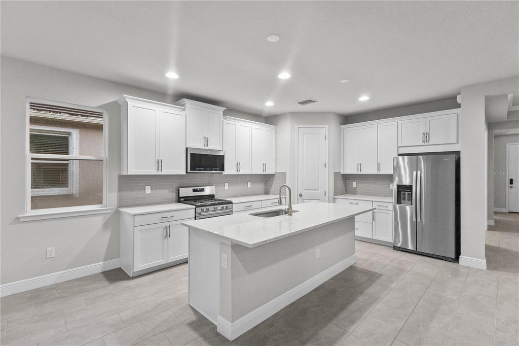 Photo of 8712 Bay Meadow Drive, Sarasota, FL 34238 (MLS # A4701124)