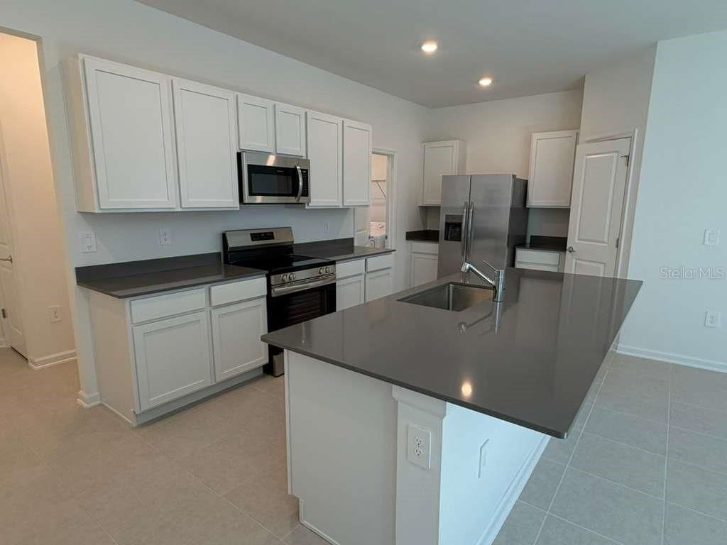 Photo of 7381 Ivy Tendril Av, Orlando, FL 32829 (MLS # O6372595)